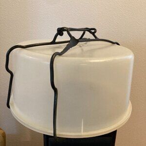 Vintage Round Tupperware covered cake holder seal 224-9 with black carry handle.